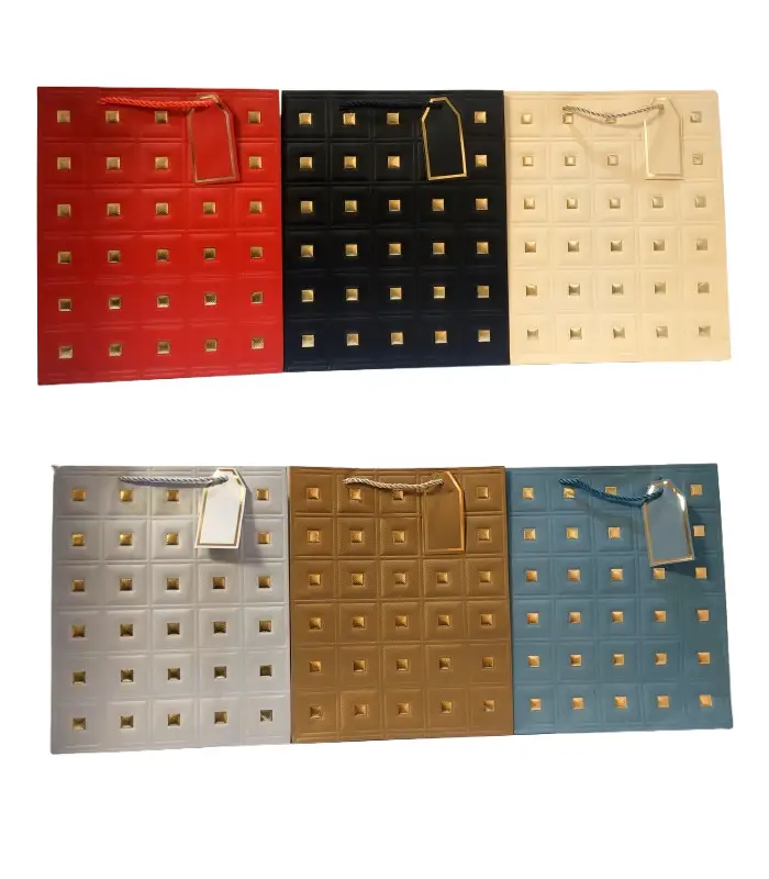 عکس شماره:2 , ساک هدیه مدل چرمی سایز (26*32*12) بسته 3 عددی (فروش عمده / خرده)