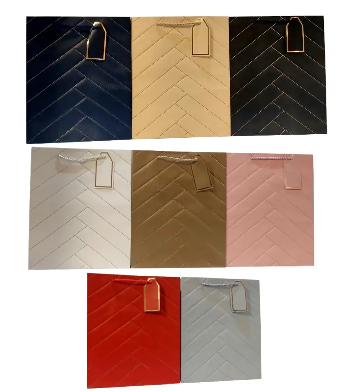 عکس شماره:0 , ساک هدیه مدل چرمی سایز (26*32*12) بسته 3 عددی (فروش عمده / خرده)